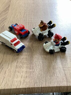 3/$10 Lot of 4 McDonald's Happy Meal toy cars ambulance bone shaker Mario kart